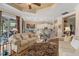 Open living area with adjacent kitchen, hardwood floors, and neutral decor at 7223 Orchid Island Pl, Bradenton, FL 34202