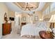 Bright main bedroom with a tray ceiling, and lots of natural light at 7223 Orchid Island Pl, Bradenton, FL 34202
