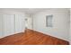 Bedroom with double door closet and wood flooring at 787 San Salvador Dr, Dunedin, FL 34698