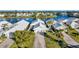 Community overview showcasing waterfront properties and lush landscaping at 805 Harrington Lake N Dr # 76, Venice, FL 34293