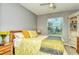 Cozy bedroom with a queen bed and built-in shelving at 8608 Stargazer St, Sarasota, FL 34238