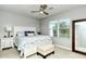 Spacious bedroom with a king-size bed and a large window at 8608 Stargazer St, Sarasota, FL 34238