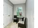 Small office space with a table and chairs at 8608 Stargazer St, Sarasota, FL 34238