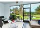 Relaxing screened patio overlooking a pond and lush landscape at 8608 Stargazer St, Sarasota, FL 34238