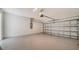 Bright garage with epoxy floor and automatic door at 10177 Lake Wales Cir, Sarasota, FL 34241