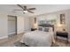 Bedroom with a queen-size bed and ceiling fan at 1200 Laurel Ave, Venice, FL 34285