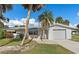 Updated single story home with attached garage and landscaped yard at 1200 Laurel Ave, Venice, FL 34285