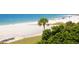 Aerial view of Siesta Beach, showing white sand and ocean at 1214 Sea Plume Way, Sarasota, FL 34242