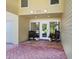 Front entry with double doors and brick flooring at 1214 Sea Plume Way, Sarasota, FL 34242