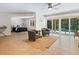 Gathering room with pool view and comfortable seating at 1214 Sea Plume Way, Sarasota, FL 34242