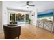 Gathering room with pool view and comfortable seating at 1214 Sea Plume Way, Sarasota, FL 34242