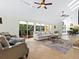 Relaxing living room with sectional sofa and fireplace at 1214 Sea Plume Way, Sarasota, FL 34242
