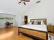 Spacious main bedroom with hardwood floors and a stunning view at 1214 Sea Plume Way, Sarasota, FL 34242