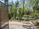 Brick patio overlooks a peaceful waterway, perfect for relaxation at 1214 Sea Plume Way, Sarasota, FL 34242