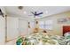 Alternative view of the fifth bedroom highlighting the closet, bed, and window at 1220 26Th W St, Bradenton, FL 34205