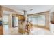 Updated kitchen with stainless steel appliances, an island with bar seating, and ample natural light at 1220 26Th W St, Bradenton, FL 34205