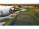 Golf course with lake and homes in background at 14622 Castle Park Ter, Lakewood Ranch, FL 34202