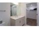 Bathroom with walk-in shower and modern vanity at 1709 N Tamiami Trl # 215, Sarasota, FL 34234