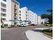 Condo building with covered parking and ample space at 1709 N Tamiami Trl # 215, Sarasota, FL 34234