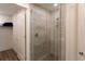 Large walk-in shower with glass enclosure and modern tile at 1709 N Tamiami Trl # 215, Sarasota, FL 34234