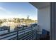 Stunning water view from private balcony, featuring boats and waterfront homes at 1709 N Tamiami Trl # 215, Sarasota, FL 34234
