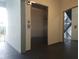 Building hallway with elevator and stairs at 210 3Rd W St # 8202, Bradenton, FL 34205