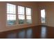 Bright living room with hardwood floors and water views at 210 3Rd W St # 8202, Bradenton, FL 34205