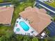 Aerial view of community pool and building at 24181 Green Heron Dr # 84, Punta Gorda, FL 33980