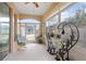 Bright, airy screened-in porch with seating at 24181 Green Heron Dr # 84, Punta Gorda, FL 33980