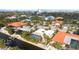 Aerial view of home showcasing the neighborhood and waterfront at 322 Avenida De Paradisio, Sarasota, FL 34242