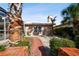 Brick pathway leads to the back of the house at 322 Avenida De Paradisio, Sarasota, FL 34242