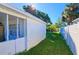 Backyard with grassy area, fence, and shed at 3310 Lexington St, Sarasota, FL 34231