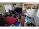 Small bedroom with double bed, TV, and built-in shelving at 3310 Lexington St, Sarasota, FL 34231