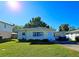 Front view of a single story house with lawn at 3310 Lexington St, Sarasota, FL 34231