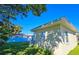 House exterior showcasing side view and lawn at 3310 Lexington St, Sarasota, FL 34231