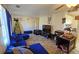 Living room with blue sectional sofa and Christmas tree at 3310 Lexington St, Sarasota, FL 34231