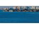 Scenic coastal view with waterfront homes and city skyline across the water at 3348 Old Oak Dr, Sarasota, FL 34239