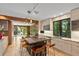 Modern kitchen with large island, stainless steel appliances, and light wood cabinetry at 3348 Old Oak Dr, Sarasota, FL 34239