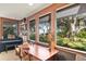 Bright home office with a view of the exterior at 3350 Old Oak Dr, Sarasota, FL 34239