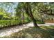 Long driveway and lush landscape provide privacy to this home at 3350 Old Oak Dr, Sarasota, FL 34239