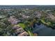 Community with pond and lush landscaping at 3824 Glen Oaks Manor Dr, Sarasota, FL 34232