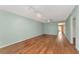 Living room features laminate flooring and neutral color palette at 425 30Th W Ave # C107, Bradenton, FL 34205