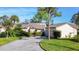Attractive exterior of single-Gathering home with two-car garage at 4419 Glebe Farm Rd # 149, Sarasota, FL 34235
