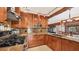Modern kitchen with granite countertops and stainless steel appliances at 4419 Glebe Farm Rd # 149, Sarasota, FL 34235