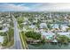 Stunning aerial view of waterfront properties with boat docks along the canals in a picturesque neighborhood at 501 65Th St, Holmes Beach, FL 34217