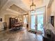 Formal dining room with hardwood floors and a beautiful chandelier at 5245 88Th E St, Bradenton, FL 34211