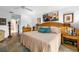 Spacious bedroom with hardwood floors and large windows at 5706 Bent Oak Dr, Sarasota, FL 34232