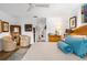 Bright bedroom featuring a king-size bed and stylish decor at 5706 Bent Oak Dr, Sarasota, FL 34232