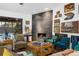 Cozy living room with a contemporary fireplace and comfy seating at 5706 Bent Oak Dr, Sarasota, FL 34232