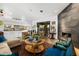 Open living room with a view of the kitchen and outdoor space at 5706 Bent Oak Dr, Sarasota, FL 34232